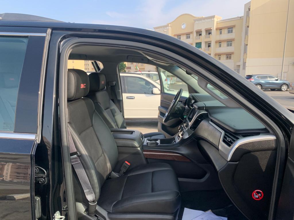 gmc suv black color vehicle front seating