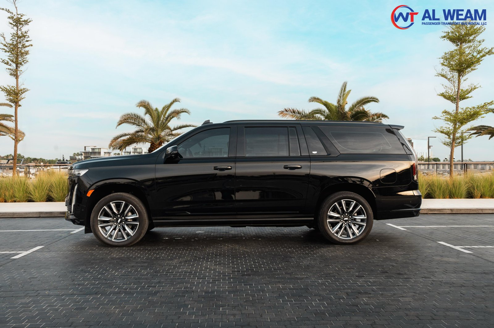 Side view of a Cadillac Escalade standing on the roads of Dubai