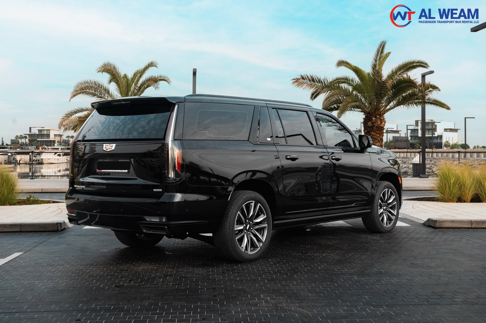 back side view of black cadillac escalade SUV