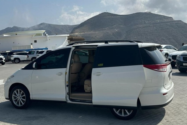 Toyota-Previa-rental-in-Dubai-side-lift-open-door